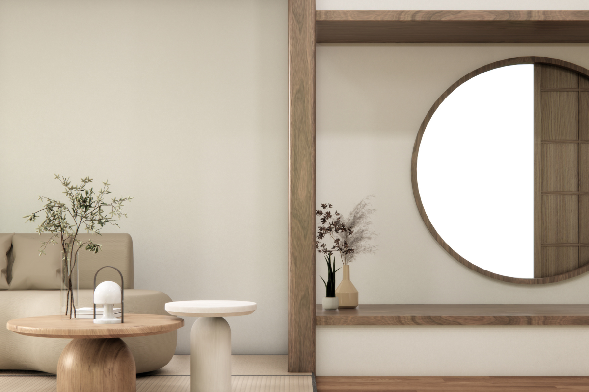 Sala moderna com espelho redondo na parede e decoração minimalista em tons neutros